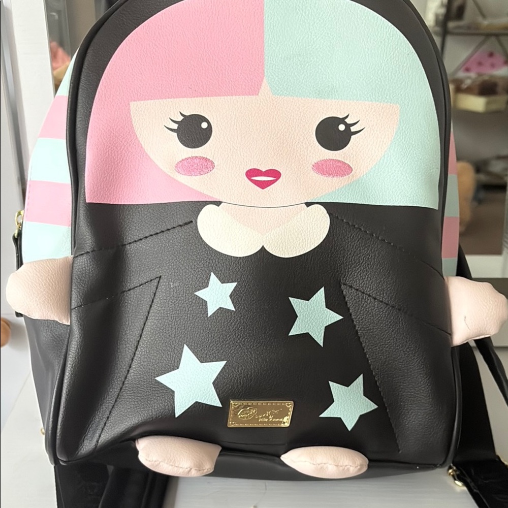 Lulu-B Black Backpack with Pastel Doll Design